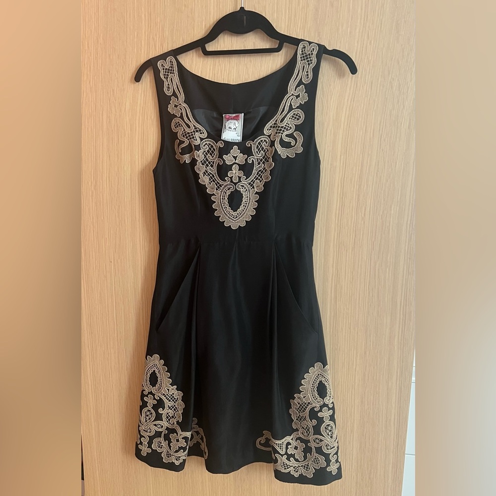 Yoana Baraschi sleeveless black silk dress in size 0. Hidden pockets, back zip.
